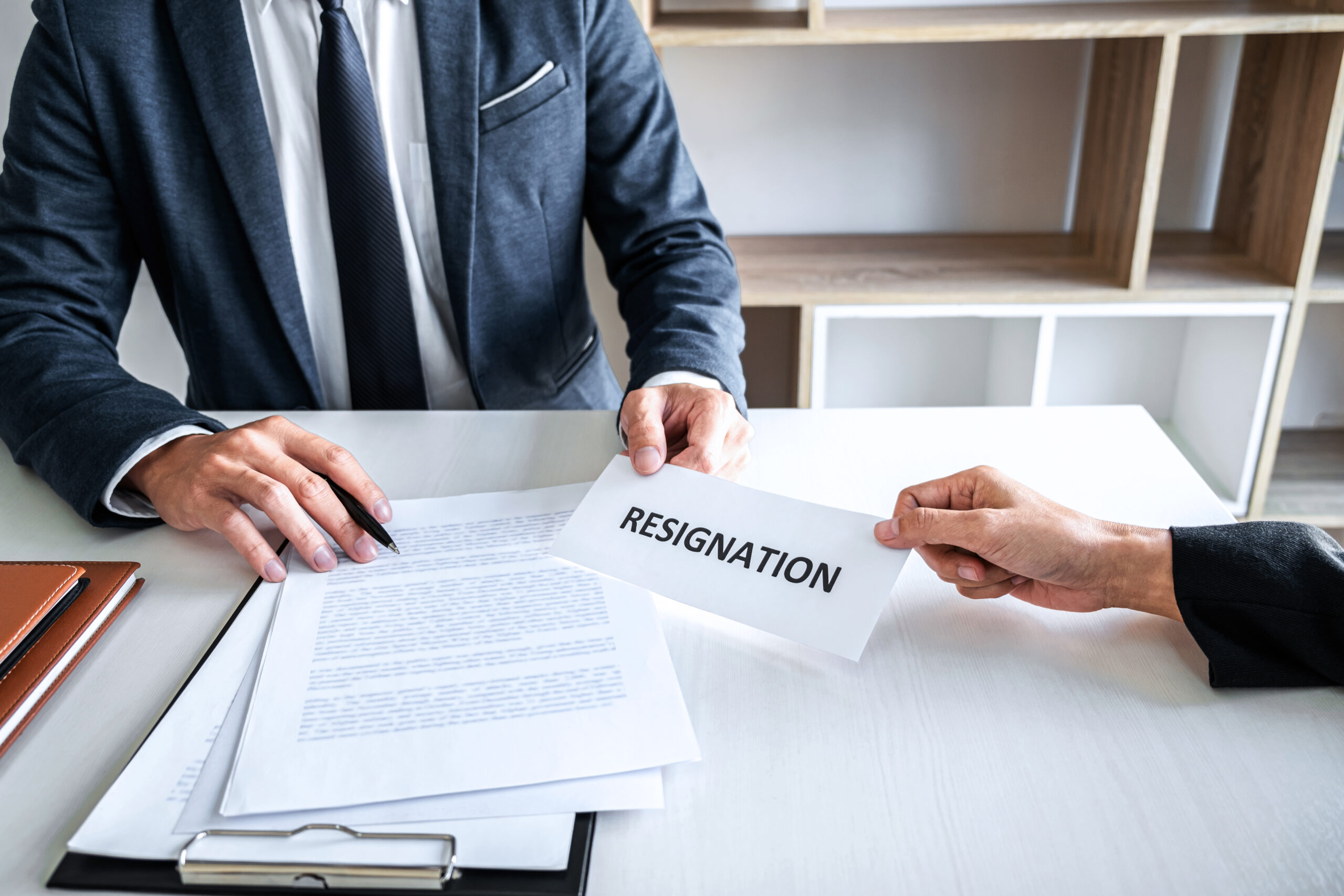 image-of-business-woman-hand-sending-a-resignation-2026-01-11-08-40-31-utc